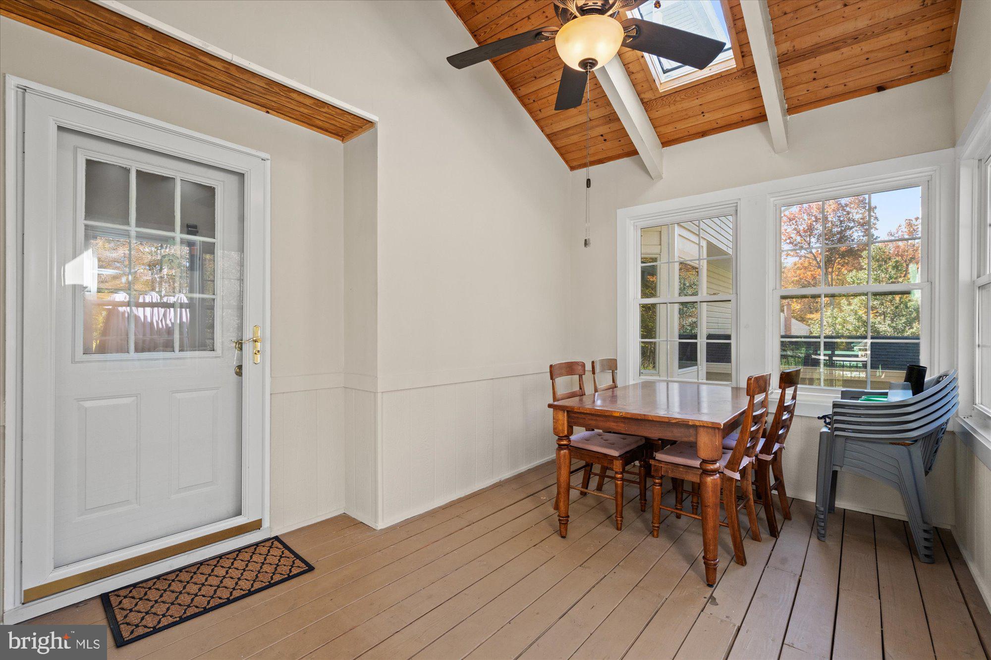 14520 Idlebrook Court Manassas, VA 20112 - Photo 67 of 87 a view of a dining room with furniture and wooden floor