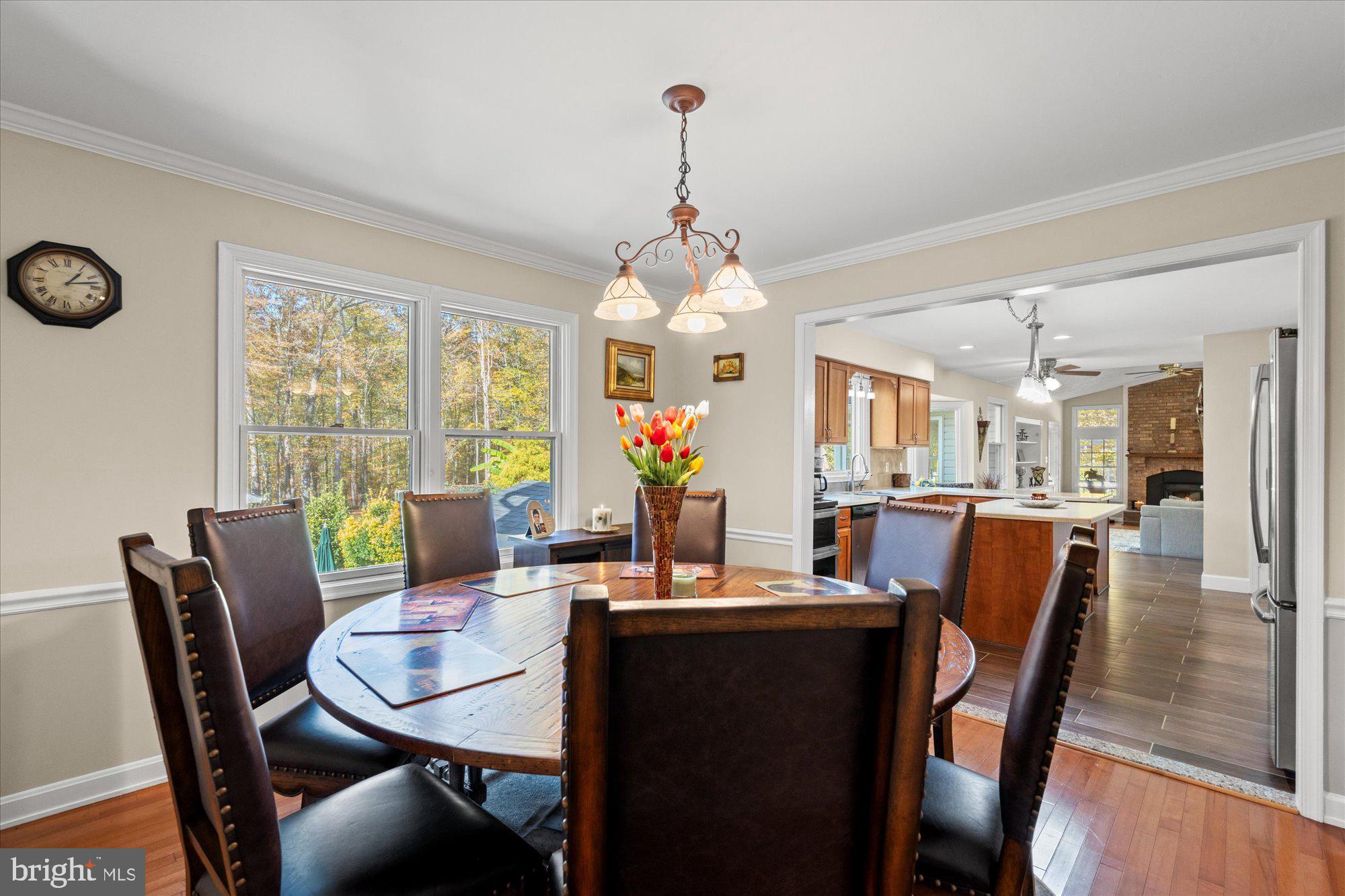 14520 Idlebrook Court Manassas, VA 20112 - Photo 70 of 87 a view of a dining room with furniture window and outside view