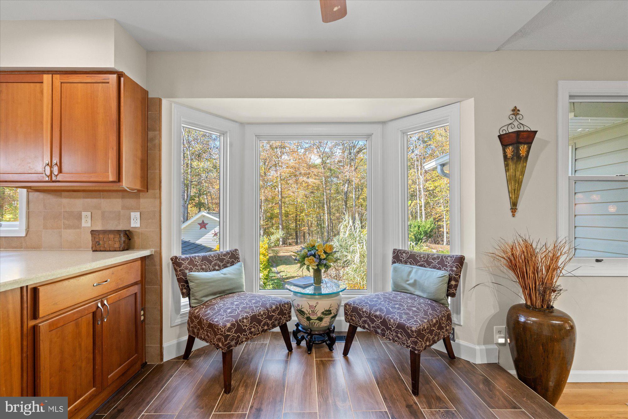 14520 Idlebrook Court Manassas, VA 20112 - Photo 71 of 87 a living room with furniture and wooden floor