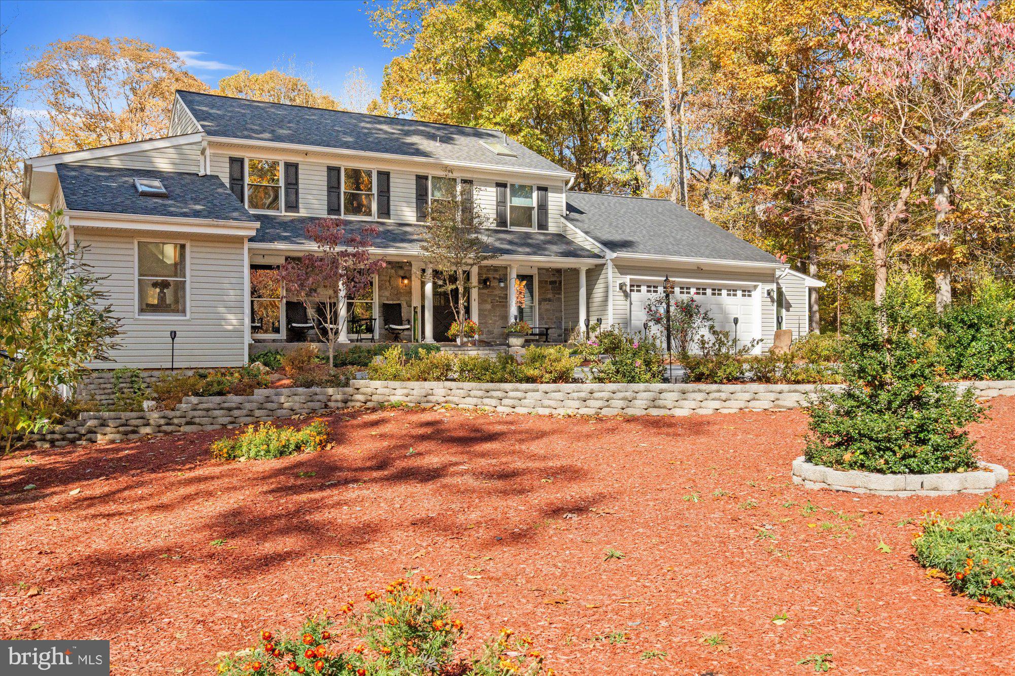 14520 Idlebrook Court Manassas, VA 20112 - Photo 82 of 87 a front view of a house with a yard
