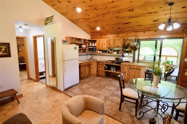 a bathroom with a sink a mirror and a bathtub