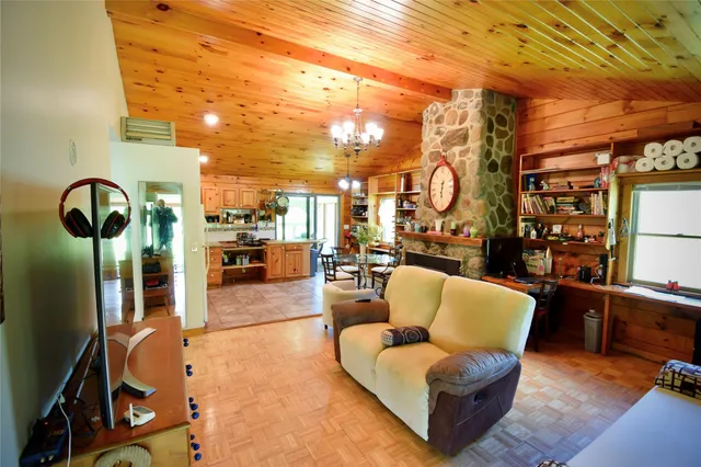 a bedroom with two beds and a window