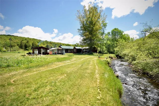 a view of swimming pool with a patio