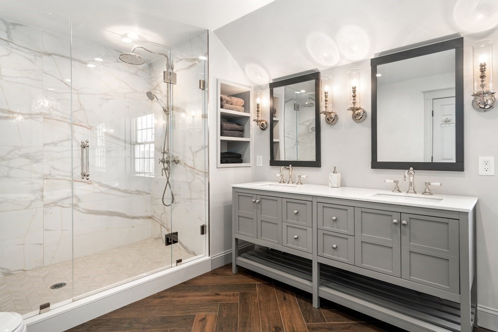 77 Monadnock Road Wellesley, MA 02481 - Photo 21 of 39 a bathroom with a double vanity sink mirror and shower