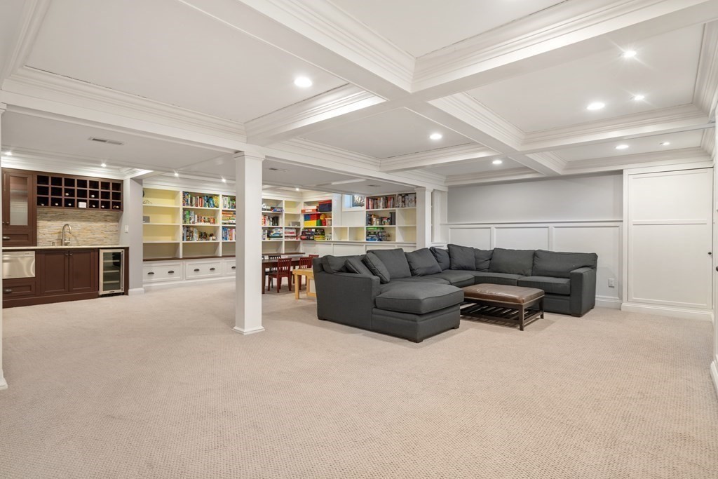 77 Monadnock Road Wellesley, MA 02481 - Photo 33 of 39 a living room with furniture and a fireplace