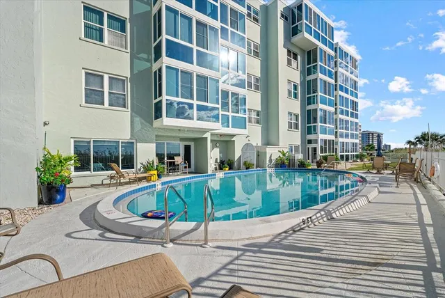 a view of a swimming pool with a terrace