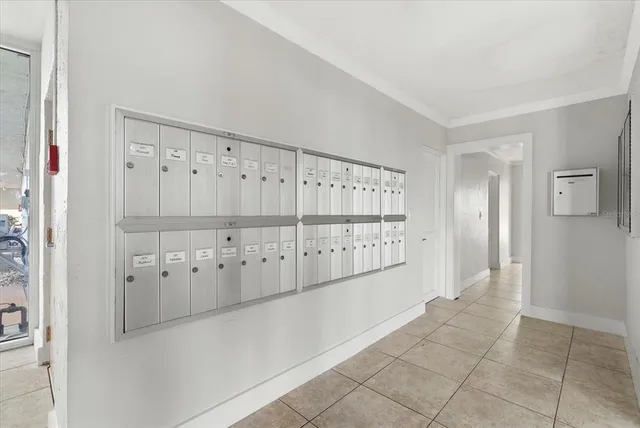 a view of a livingroom with furniture and an entryway