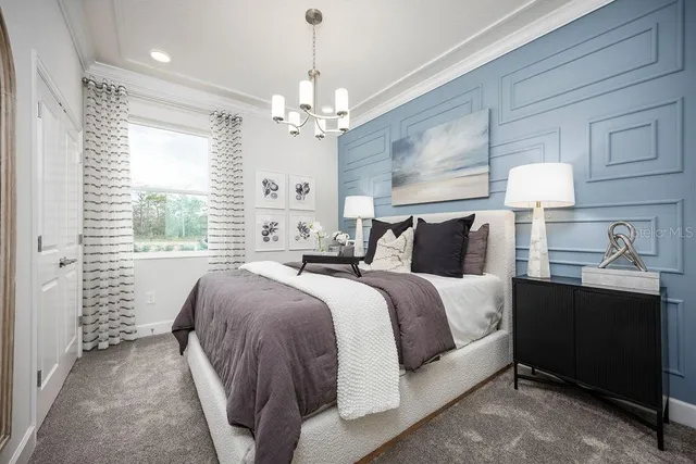 a bed room with a bed and a window