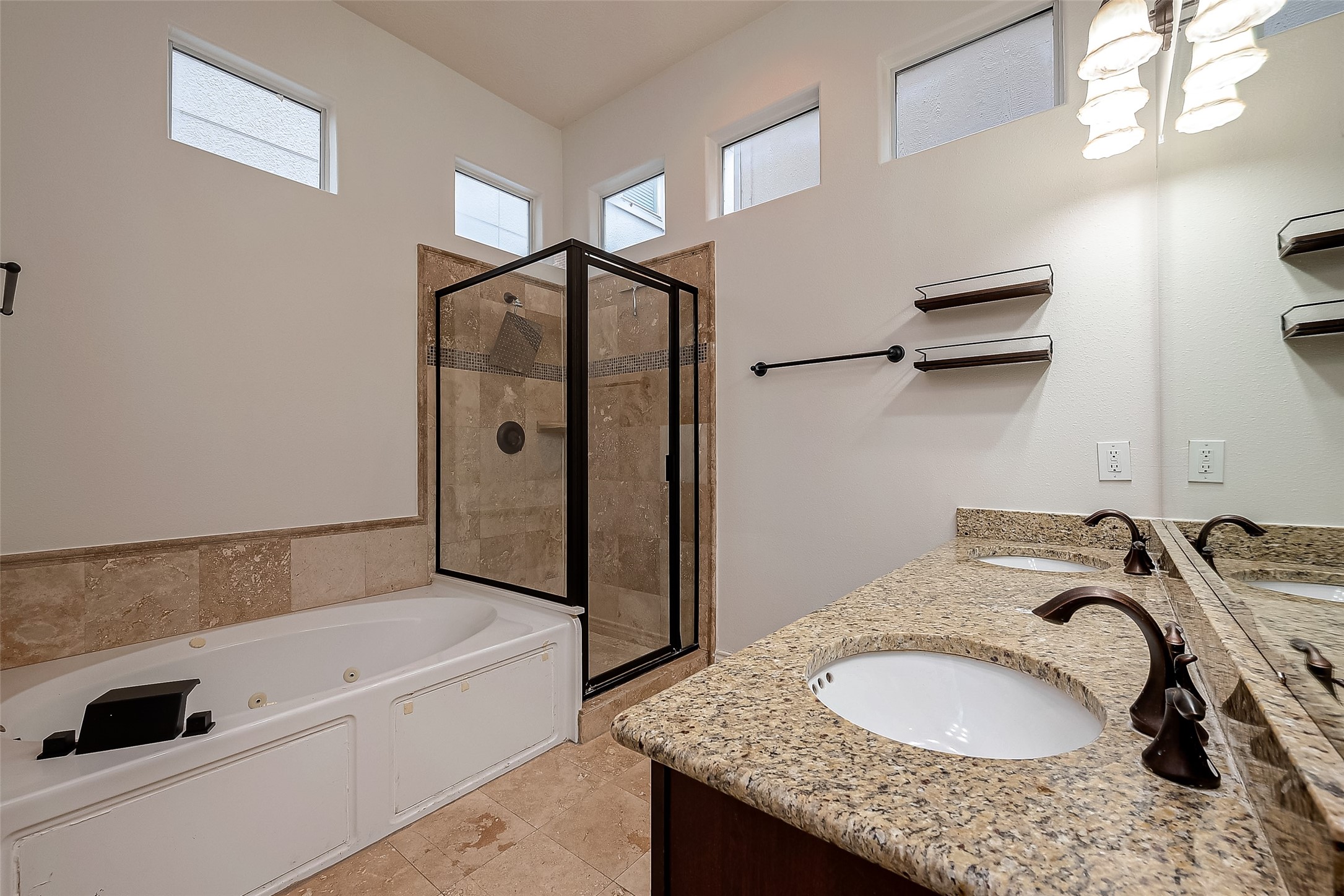 5608 Kansas Street, Unit B Houston, TX 77007 - Photo 17 of 24 A separate stand alone shower and jetted tub, perfect for relaxation.