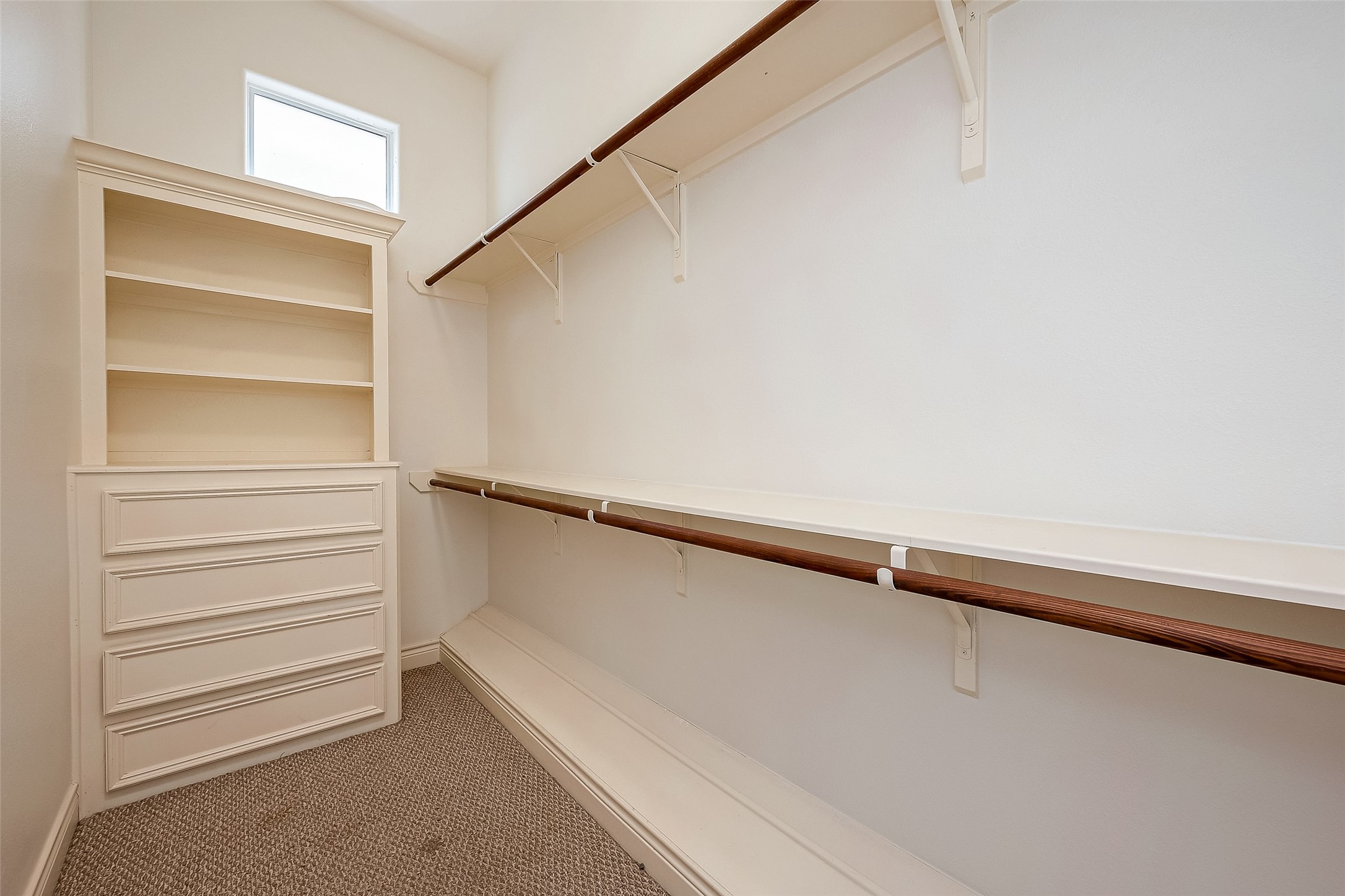 5608 Kansas Street, Unit B Houston, TX 77007 - Photo 18 of 24 Full walk in closet with built in shelving.