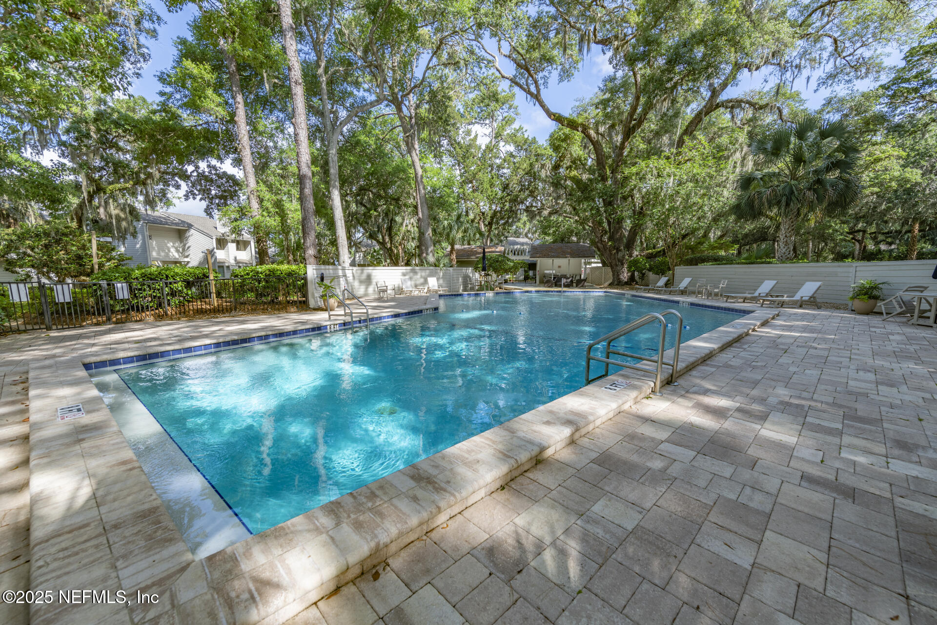 3426 Sea Marsh Road Fernandina Beach, FL 32034 - Photo 7 of 39 a view of a backyard with large trees