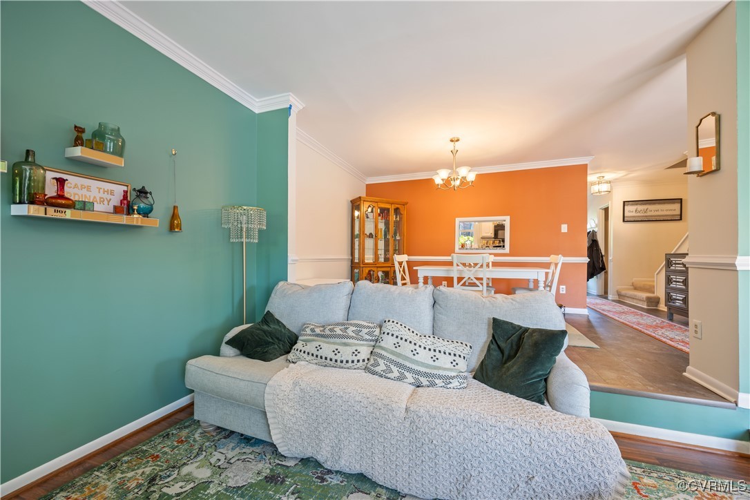 11629 East Briar Patch Drive Midlothian, VA 23113 - Photo 11 of 18 a living room with furniture and a wooden floor