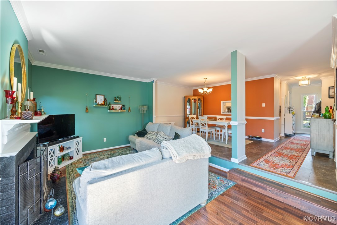 11629 East Briar Patch Drive Midlothian, VA 23113 - Photo 12 of 18 a living room with furniture a rug and a flat screen tv