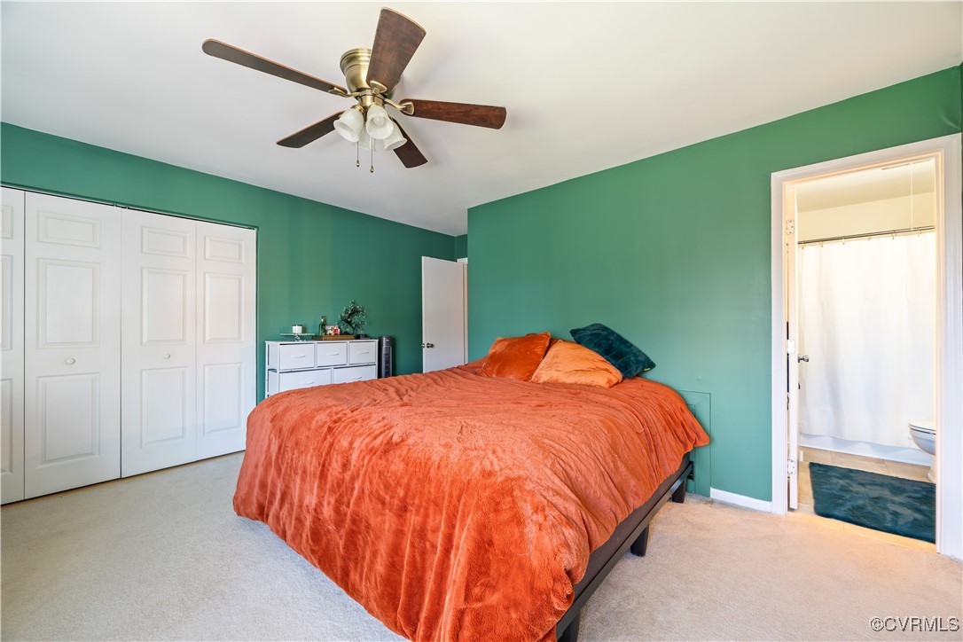 11629 East Briar Patch Drive Midlothian, VA 23113 - Photo 14 of 18 a bed sitting in a spacious bedroom next to a window
