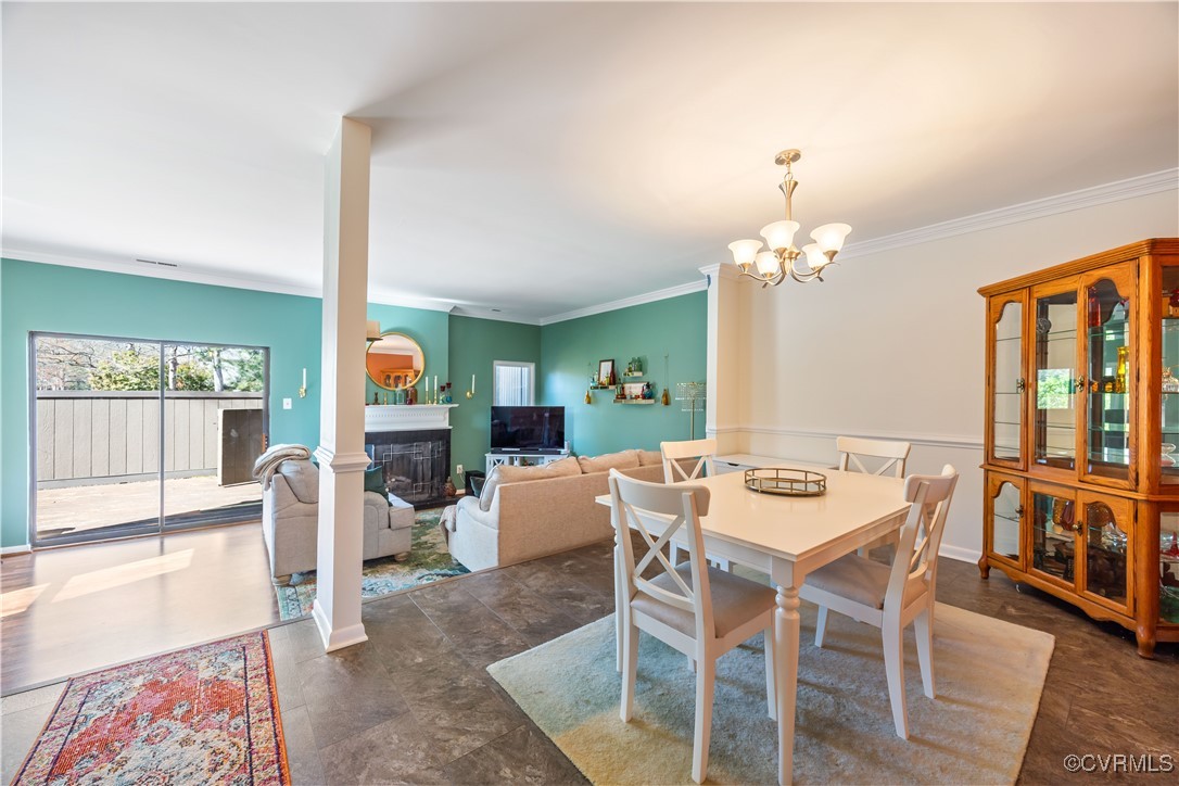 11629 East Briar Patch Drive Midlothian, VA 23113 - Photo 7 of 18 a view of a dining room with furniture and wooden floor