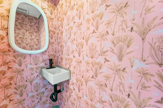 a bathroom with a toilet and a sink