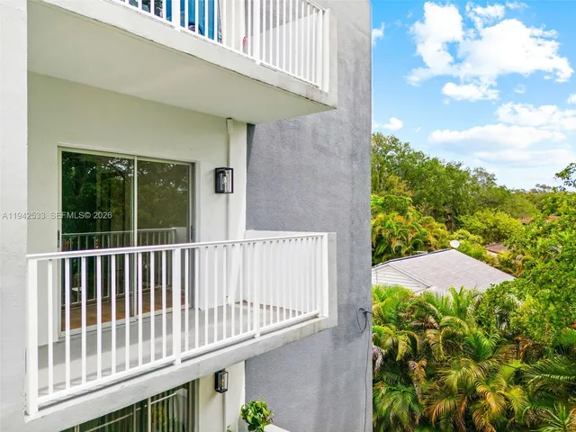 a view of a balcony with an outdoor space