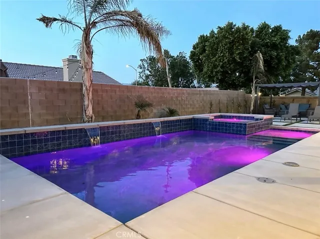a bathroom with a double vanity sink toilet and shower