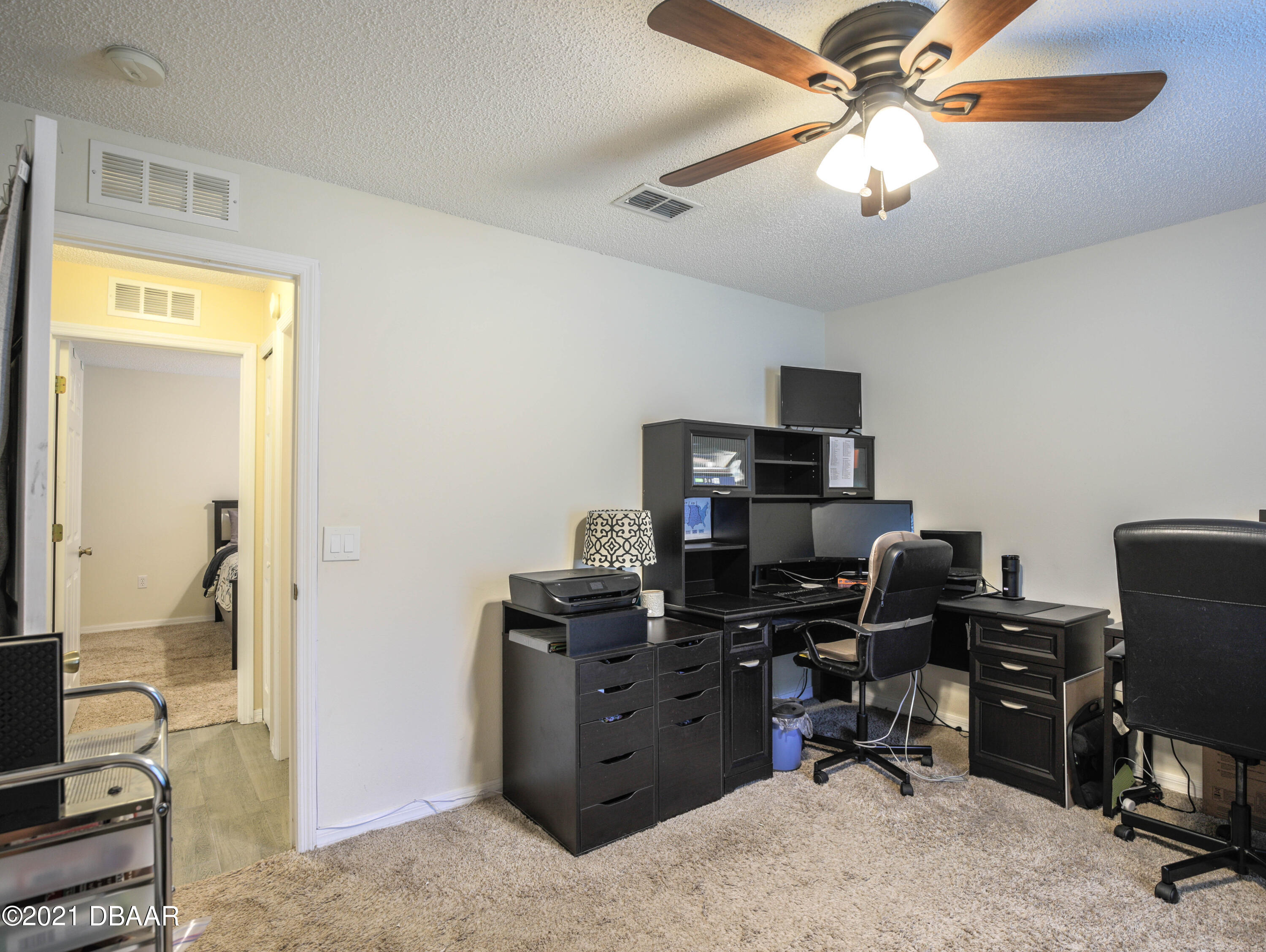 1811 Lime Tree Drive Edgewater, FL 32132 - Photo 24 of 35 a view of a workspace with furniture