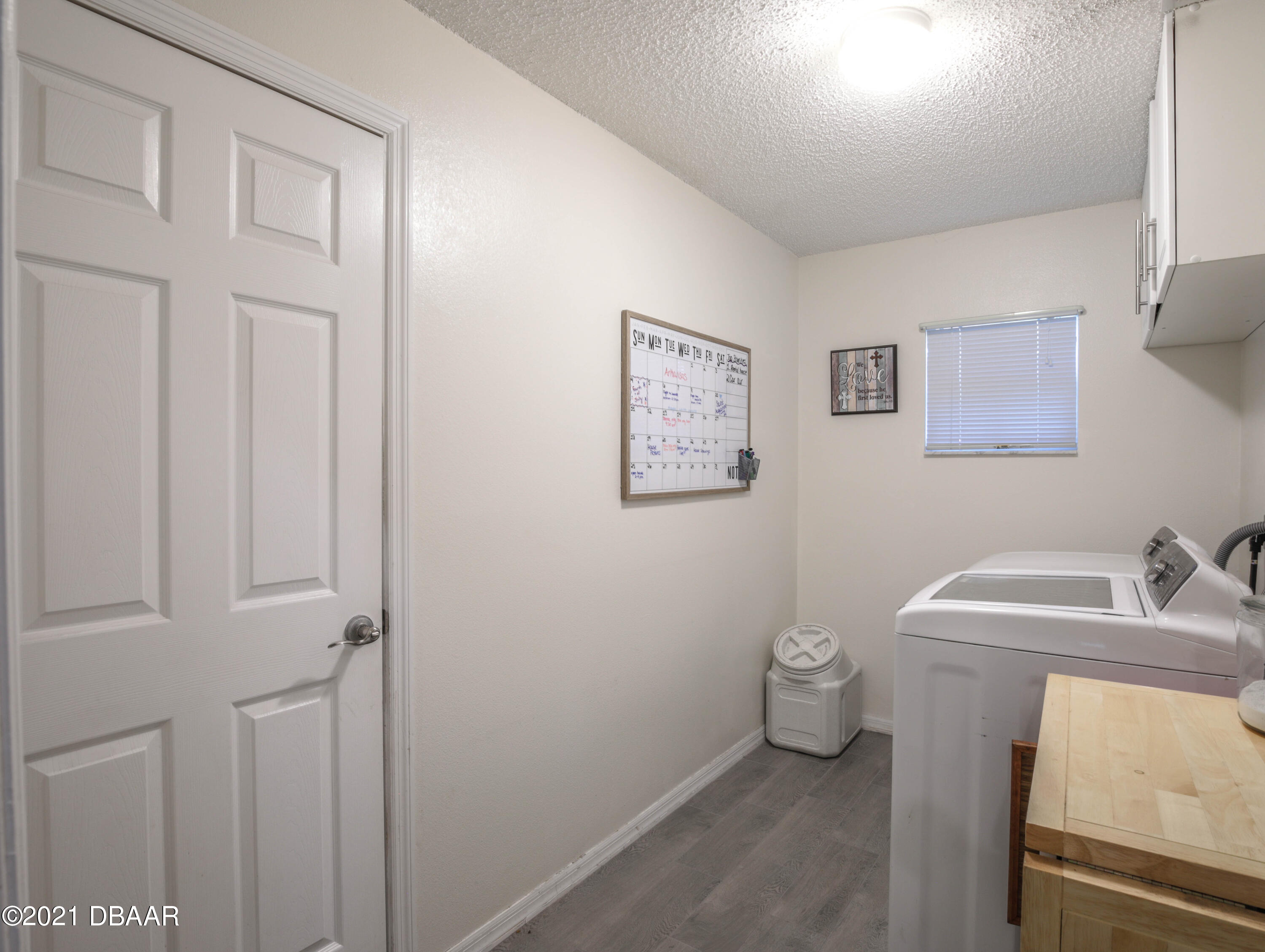 1811 Lime Tree Drive Edgewater, FL 32132 - Photo 25 of 35 a bathroom with a sink toilet and vanity