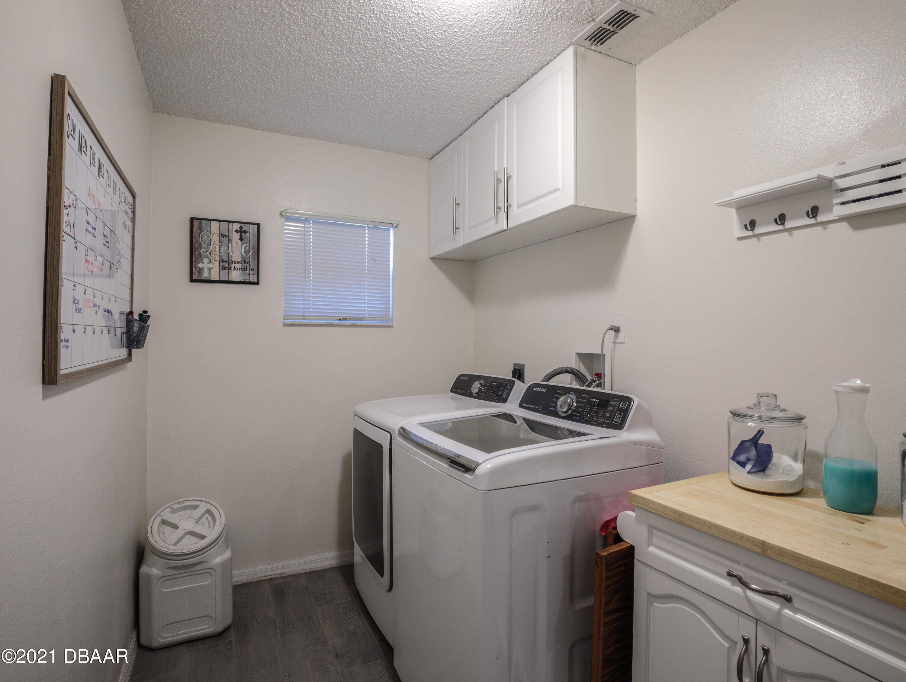 1811 Lime Tree Drive Edgewater, FL 32132 - Photo 26 of 35 a utility room with sink dryer and washer