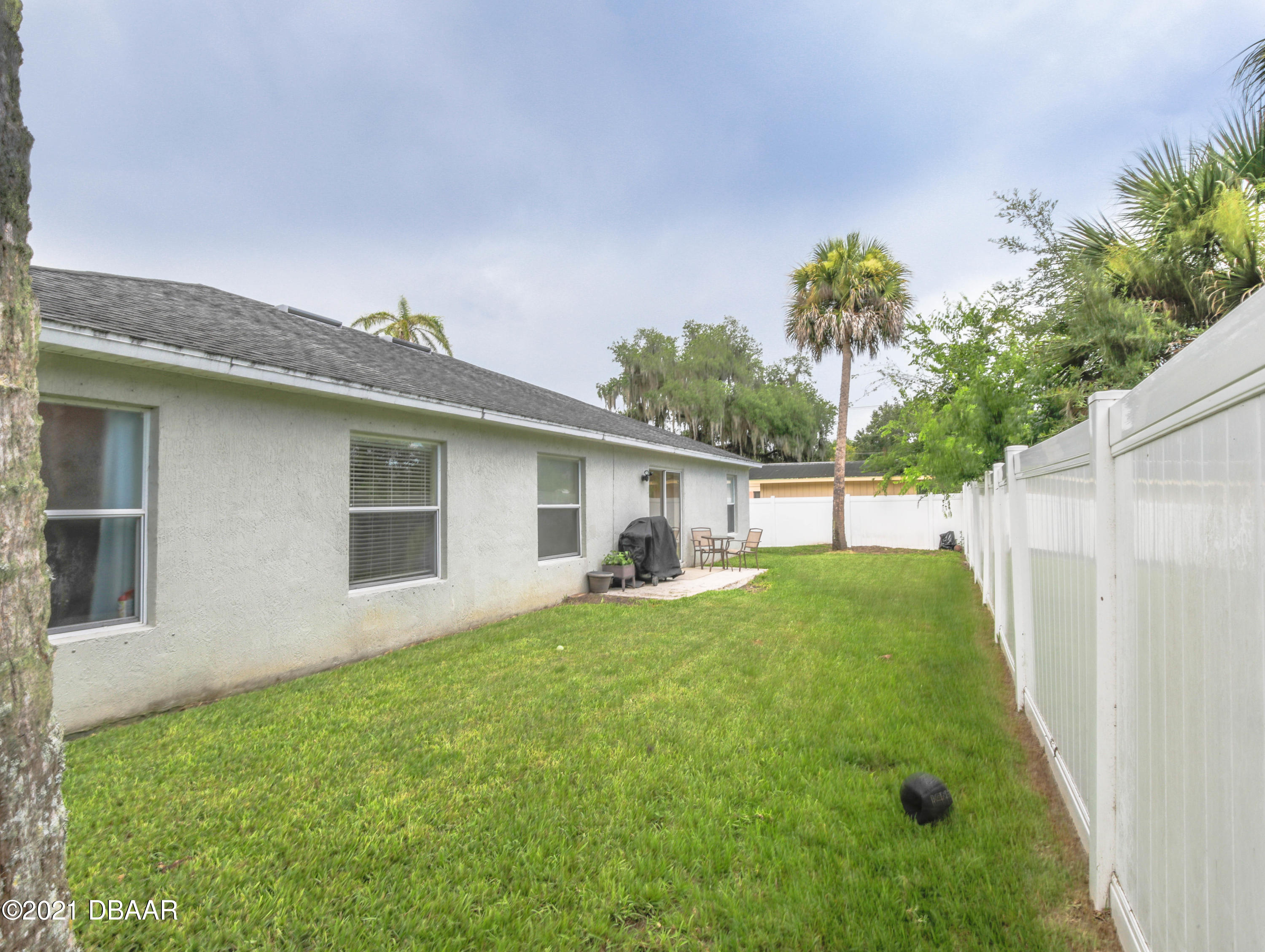 1811 Lime Tree Drive Edgewater, FL 32132 - Photo 30 of 35 a house view with a garden space