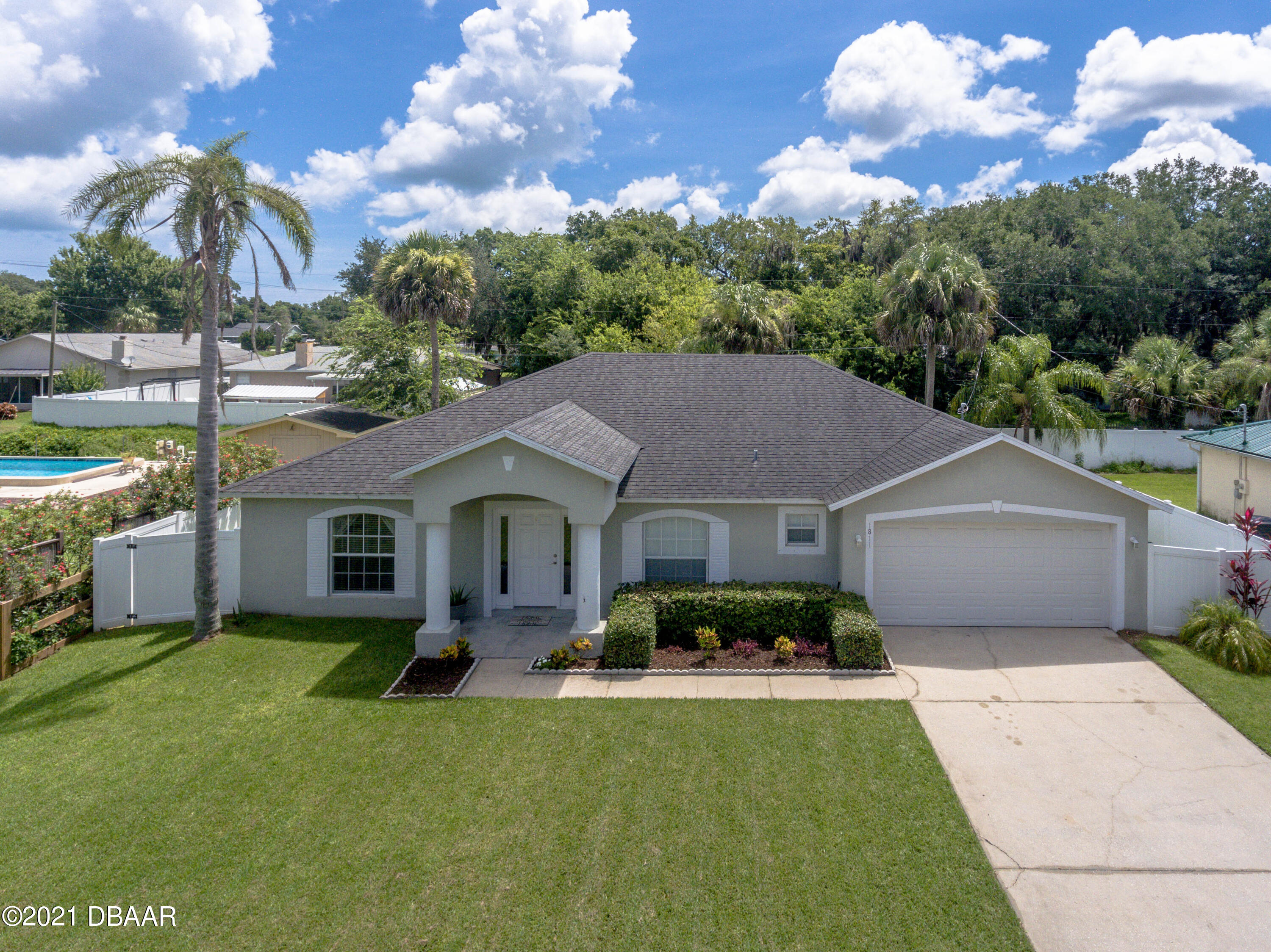 1811 Lime Tree Drive Edgewater, FL 32132 - Photo 34 of 35 a front view of house with yard and green space