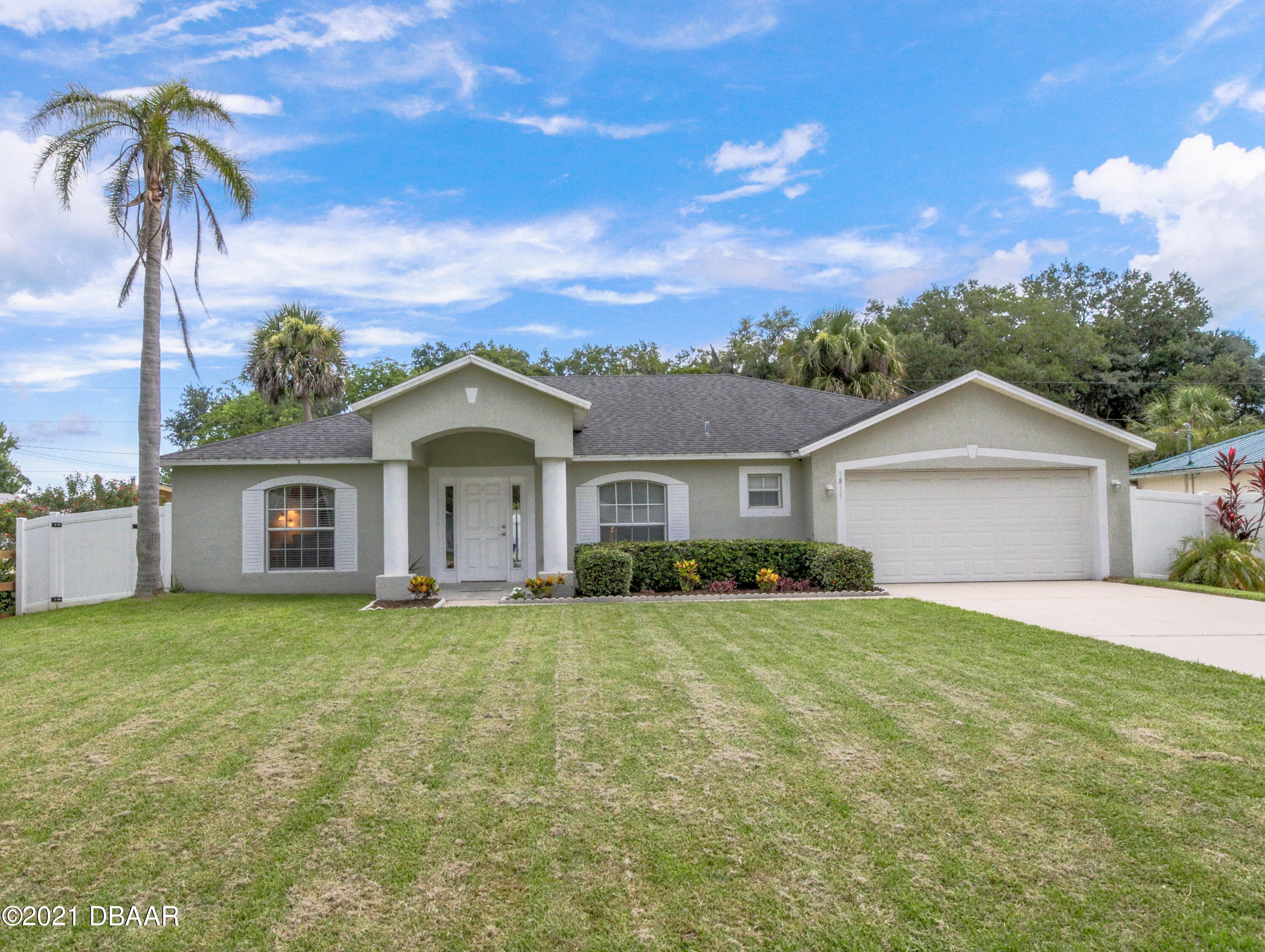1811 Lime Tree Drive Edgewater, FL 32132 - Photo 35 of 35 front view of a house with a yard