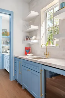 a kitchen with sink and window