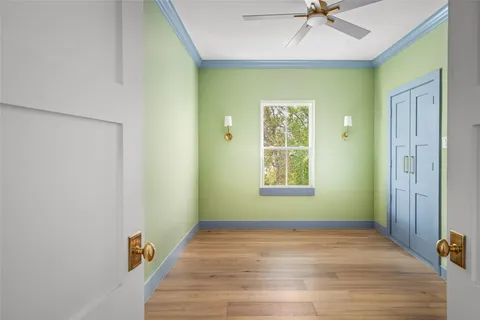a view of a living room and shelves