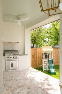 a view of kitchen with furniture and a window
