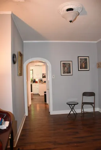 a view of livingroom with hardwood floor and a ceiling fan