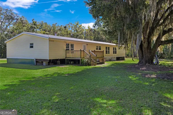 a house view with a garden space