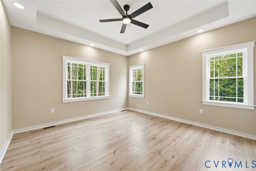 239 Bumpass Road Bumpass, VA 23024 - Photo 26 of 44 Spacious room featuring wood-finish flooring and a