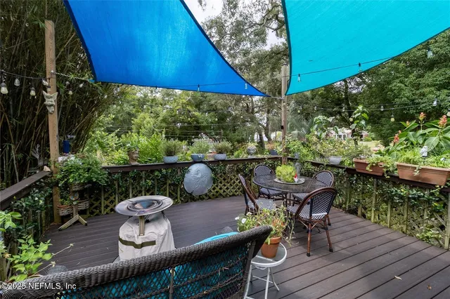 a view of a balcony with chairs