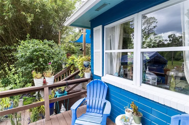 a view of a swimming pool and a yard