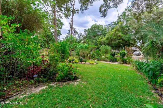a view of a chairs and table in the patio