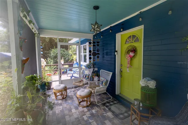 a living room with furniture a rug and a fireplace