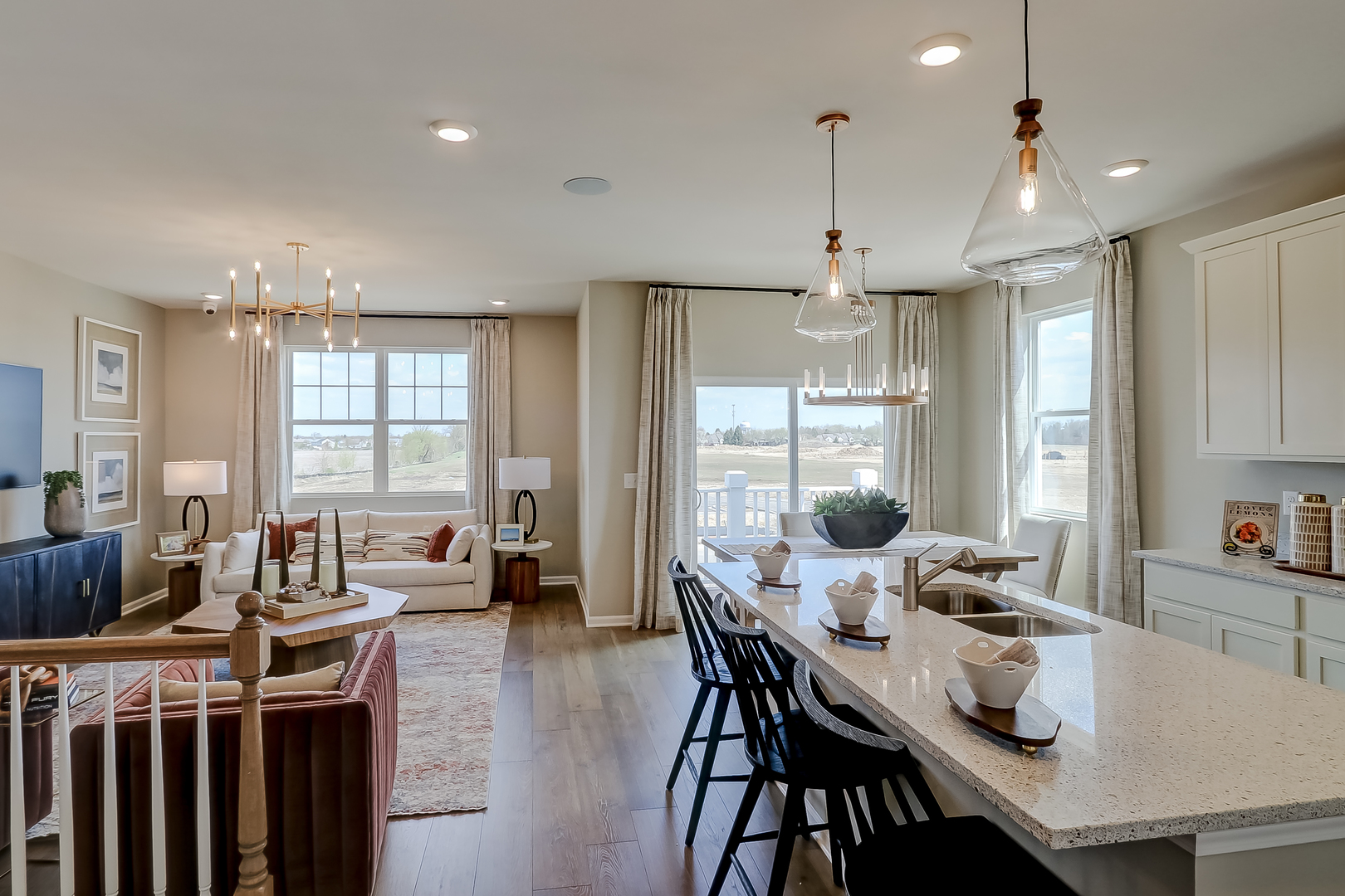 546 Comstock Road South Elgin, IL 60177 - Photo 15 of 31 a view of a dining room and livingroom with furniture window and wooden floor