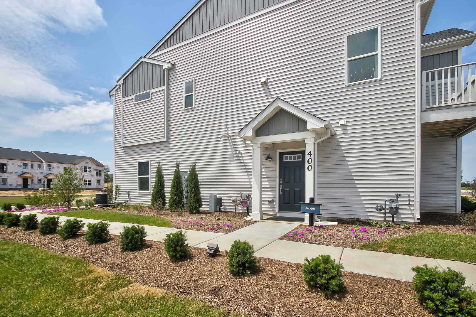 546 Comstock Road South Elgin, IL 60177 - Photo 2 of 31 a front view of a house with a yard
