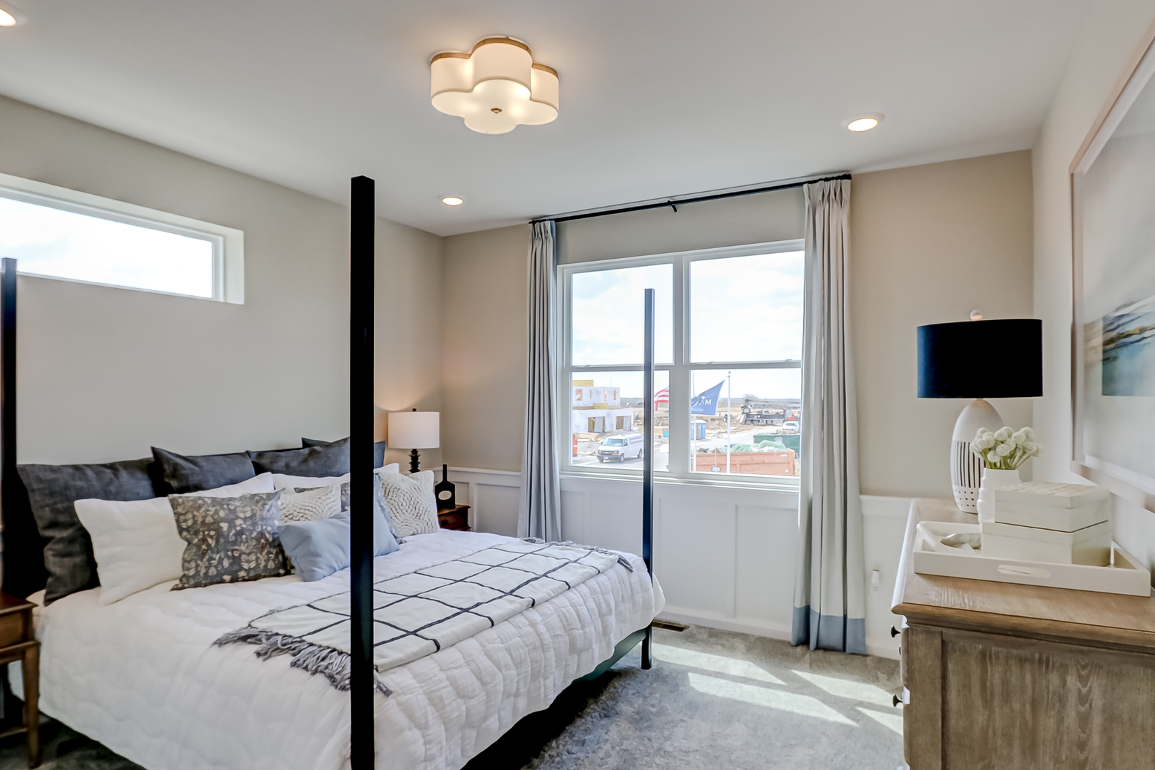 546 Comstock Road South Elgin, IL 60177 - Photo 24 of 31 a bedroom with a large bed and a flat tv screen on dresser