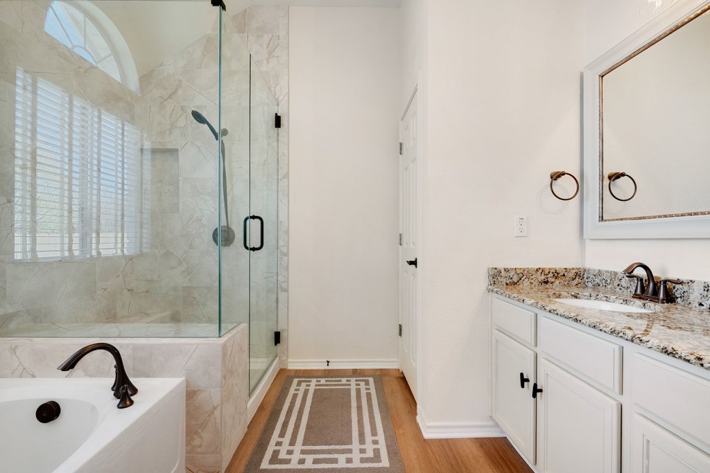 322 River Bluff Circle Georgetown, TX 78626 - Photo 21 of 35 a bathroom with a sink and a shower