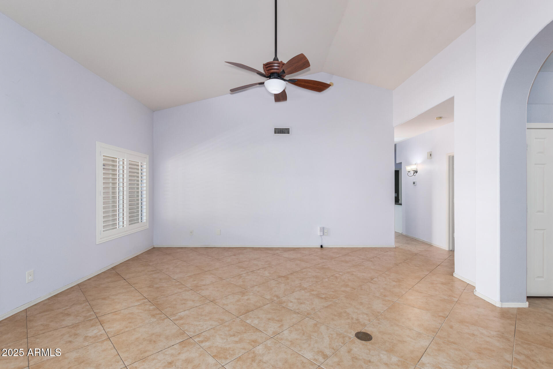 4226 East Rockledge Road Phoenix, AZ 85044 - Photo 13 of 36 a view of a room with window and a ceiling fan