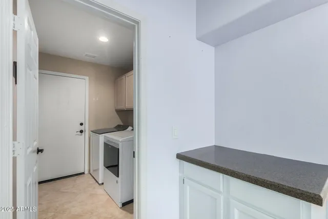 a room with a washer and dryer