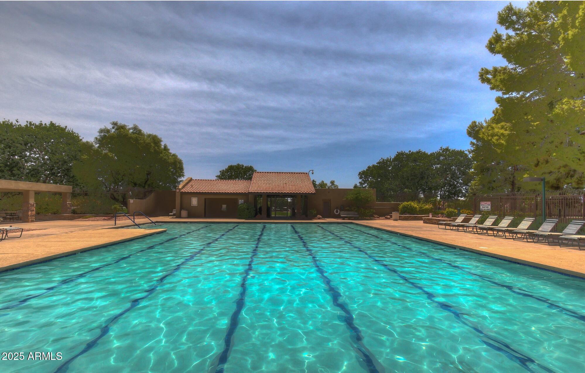 4226 East Rockledge Road Phoenix, AZ 85044 - Photo 34 of 36 a view of a backyard with swimming pool