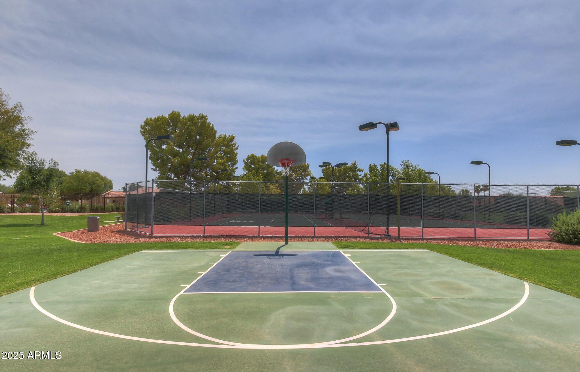 4226 East Rockledge Road Phoenix, AZ 85044 - Photo 36 of 36 a view of a swimming pool with a yard