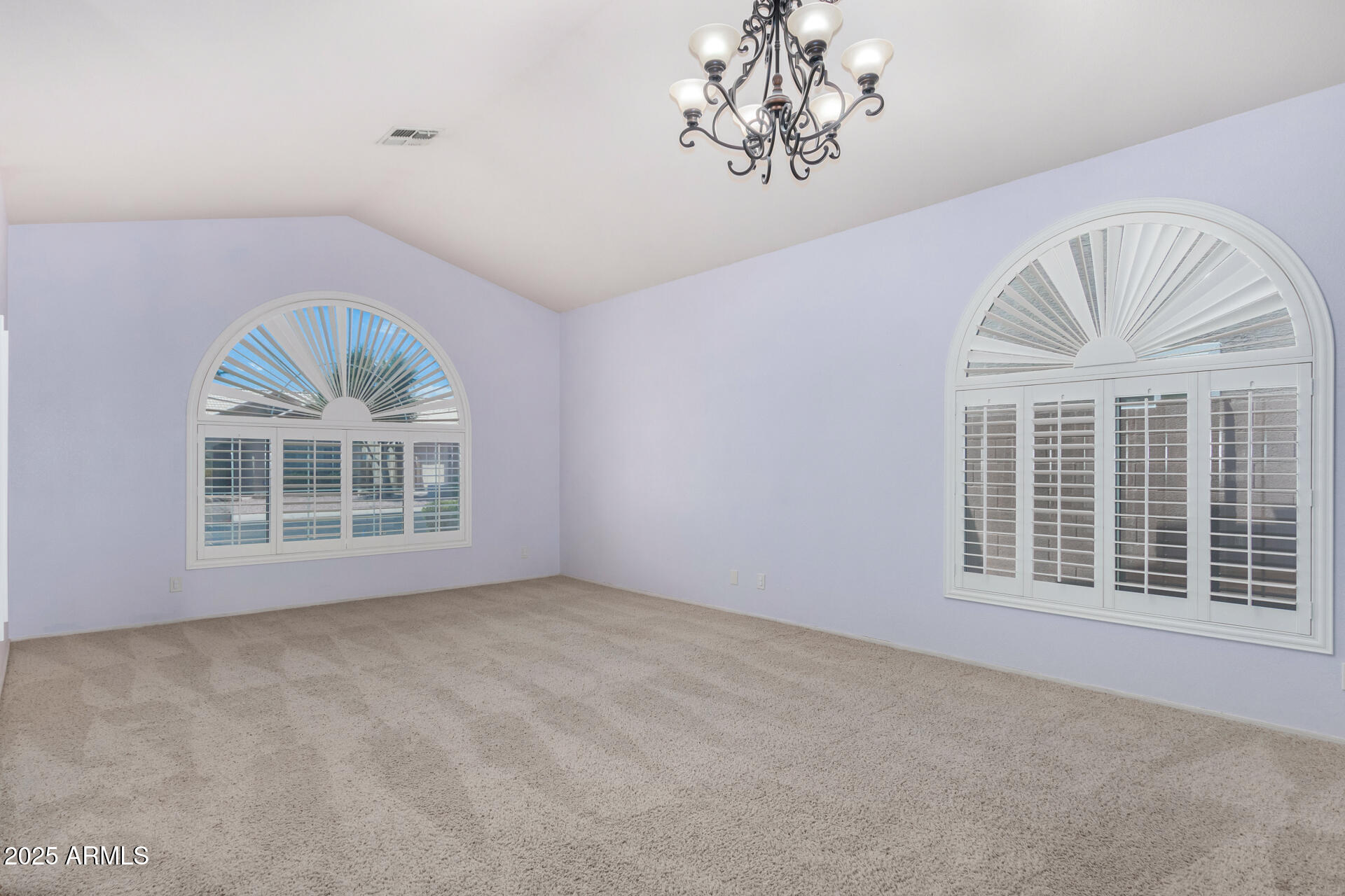 4226 East Rockledge Road Phoenix, AZ 85044 - Photo 5 of 36 an empty room with a window