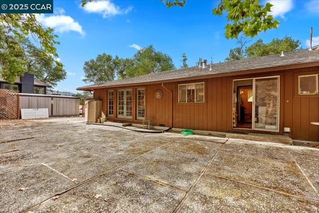 a front view of a house with a garage