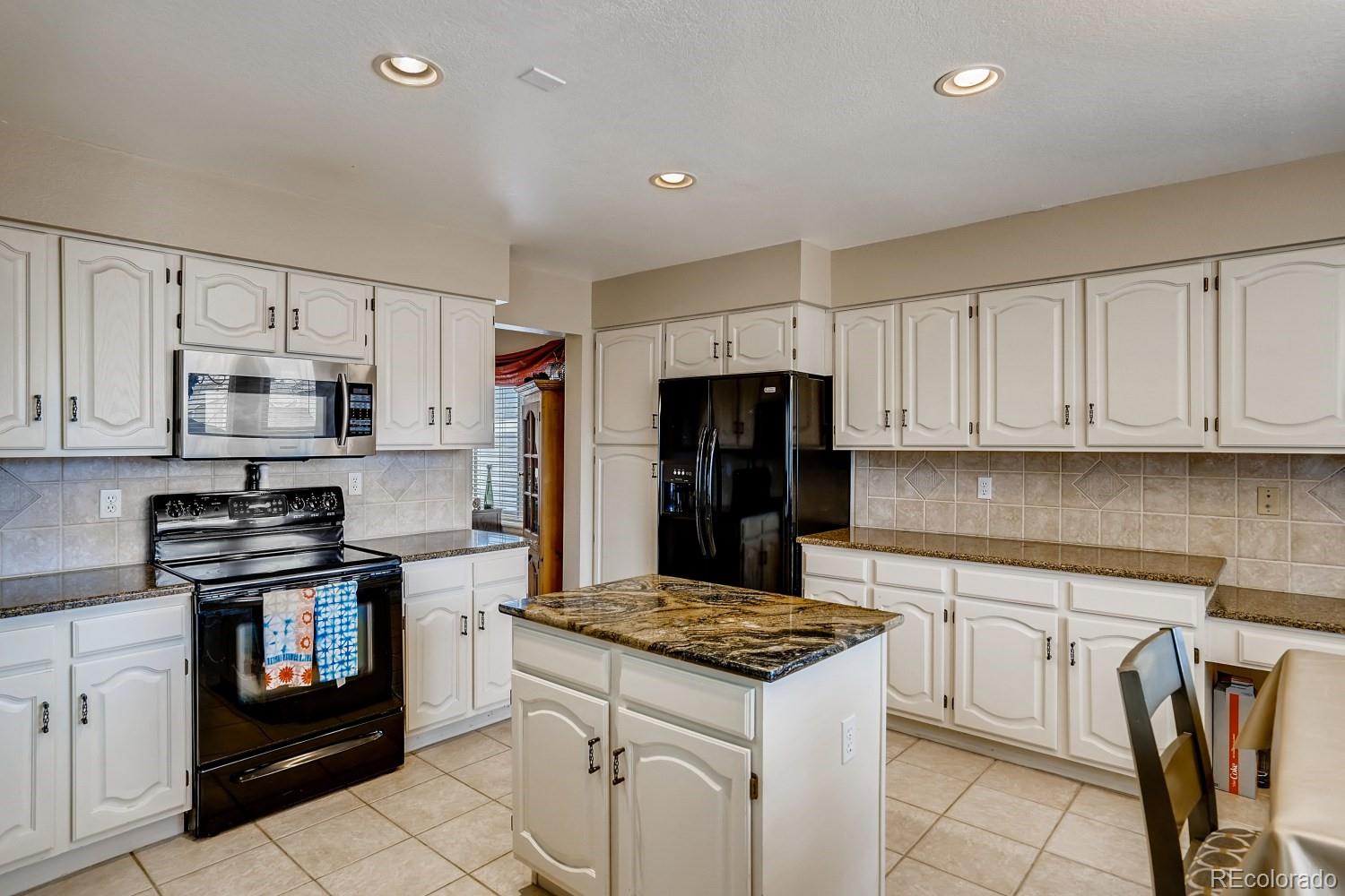 9638 Pinebrook Street Highlands Ranch, CO 80130 - Photo 6 of 35 Gallery Image 6