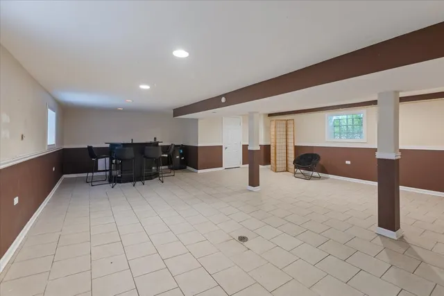 a view of kitchen with furniture and window